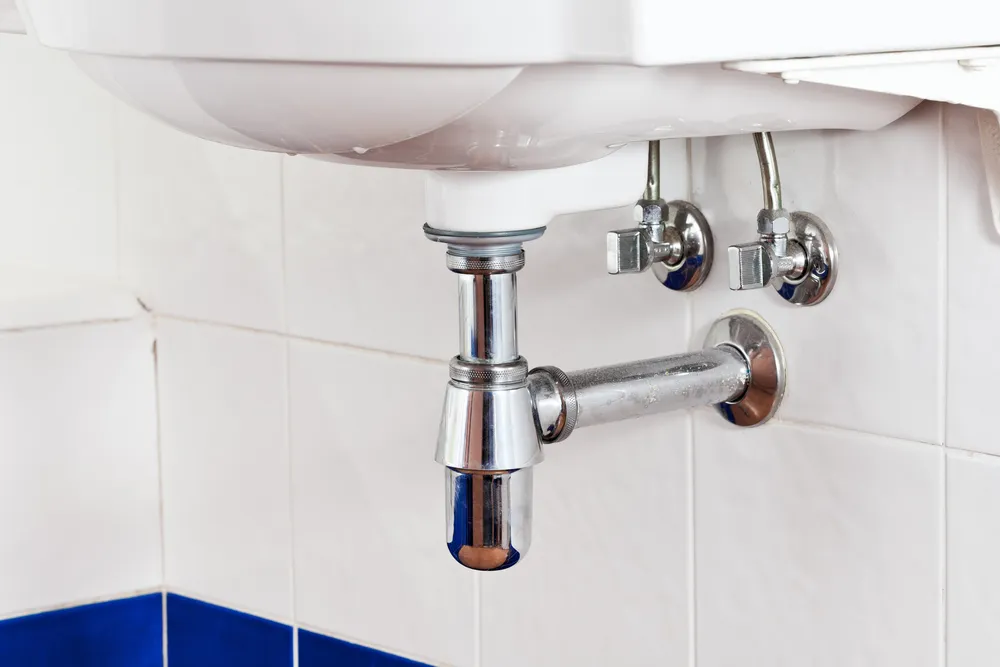 New bathroom basin waste, trap and isolation valves fitted by JRS Group Ltd