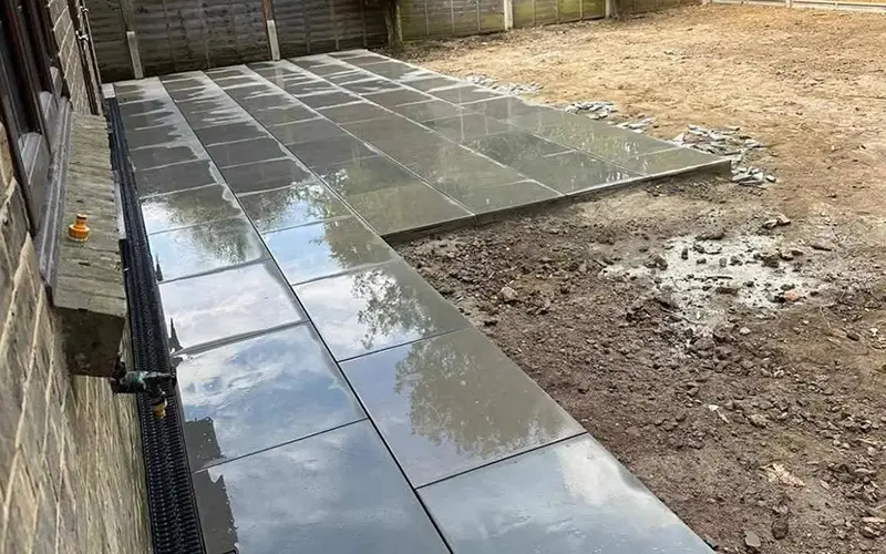 Porcelain patio installation by JRS Group Ltd