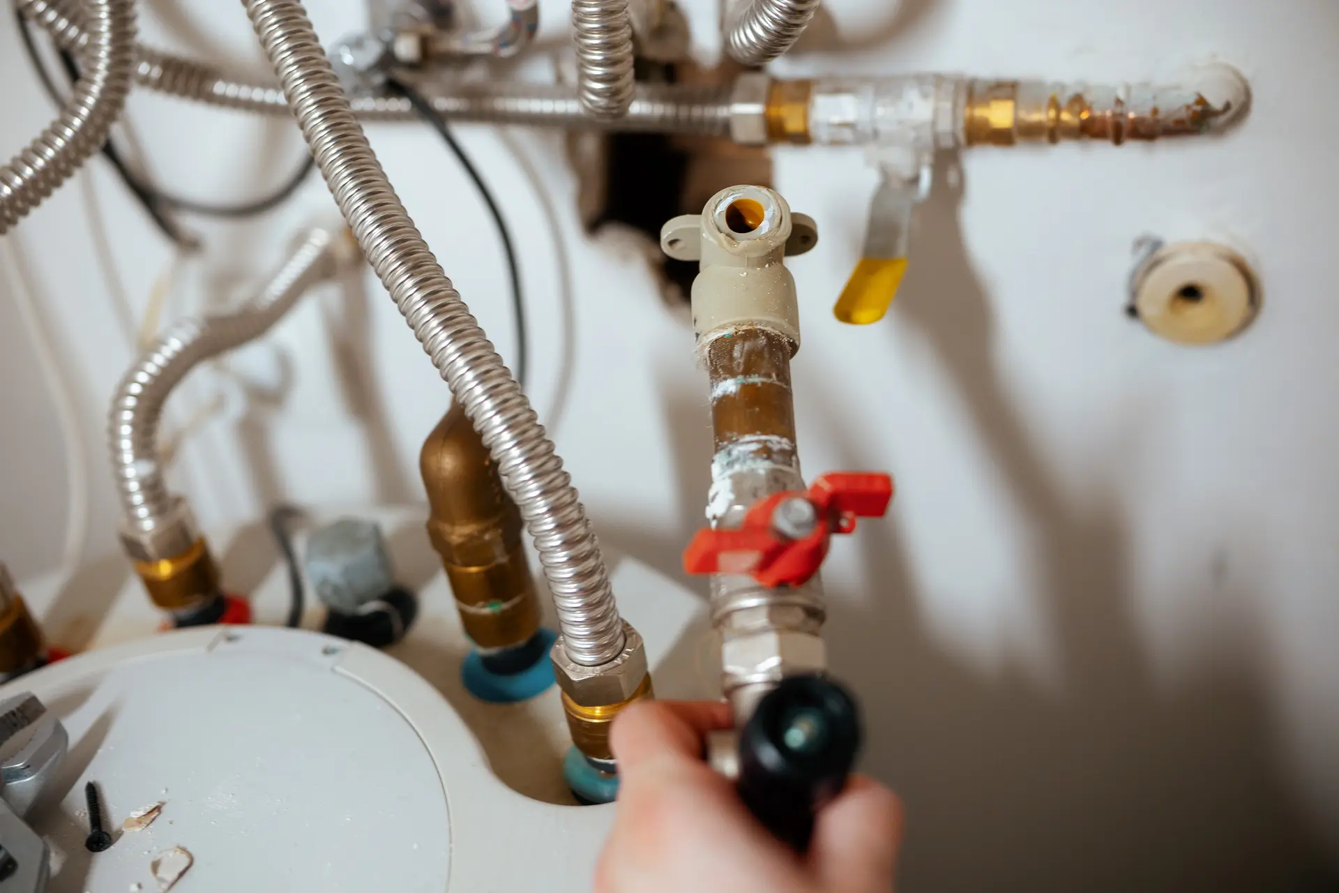 JRS Group Ltd registered gas engineer servicing a boiler in Croydon